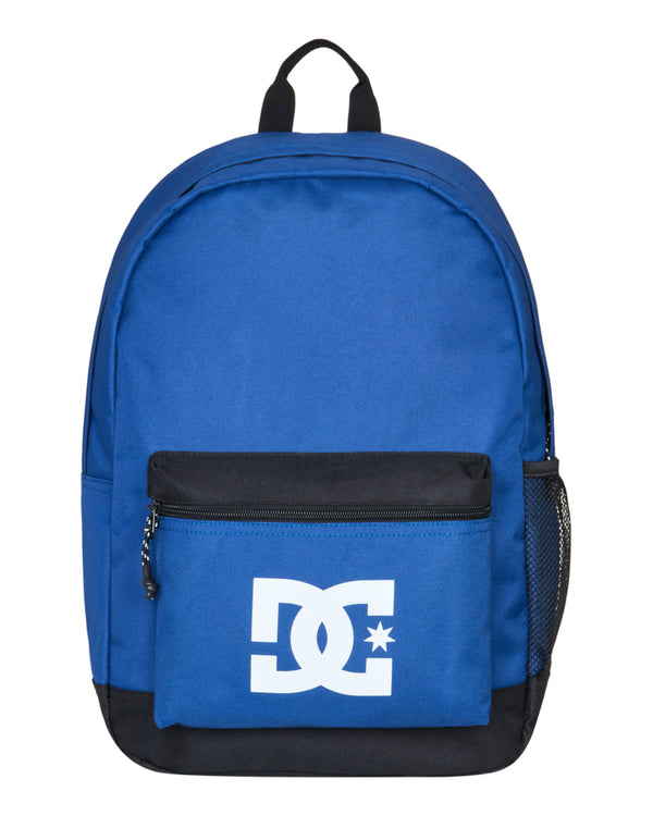 Front view of blue DC backpack with black base and front zip pocket featuring white DC logo