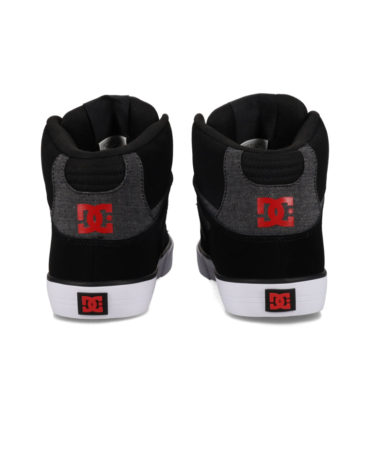 Back view of DC high-tops featuring grey panel detailing and red heel logos