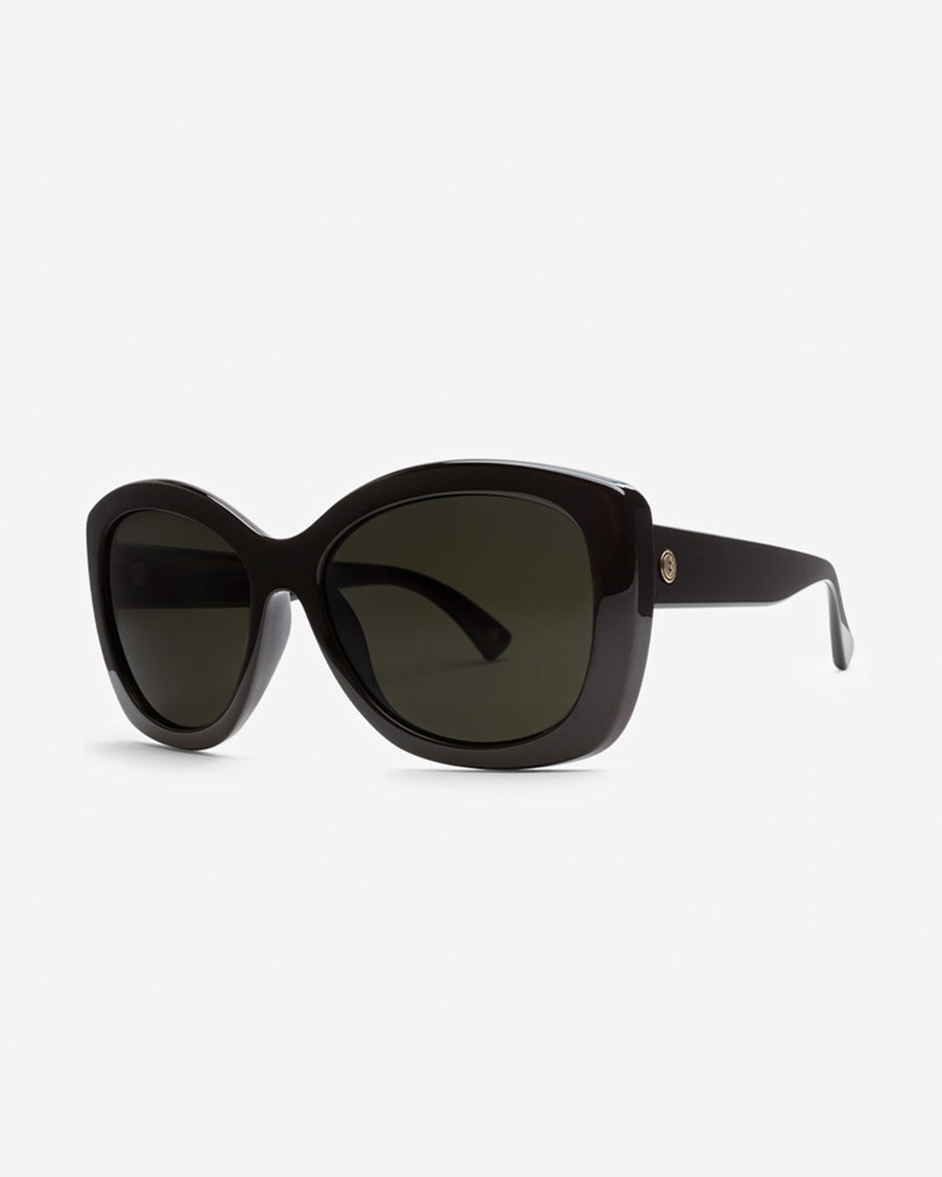 Angled view of black sunglasses with thick frame and gold logo detail near the hinge.
