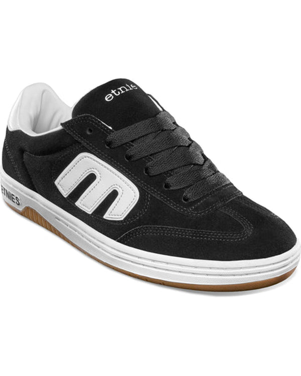 Angled view showing black laces and suede upper.