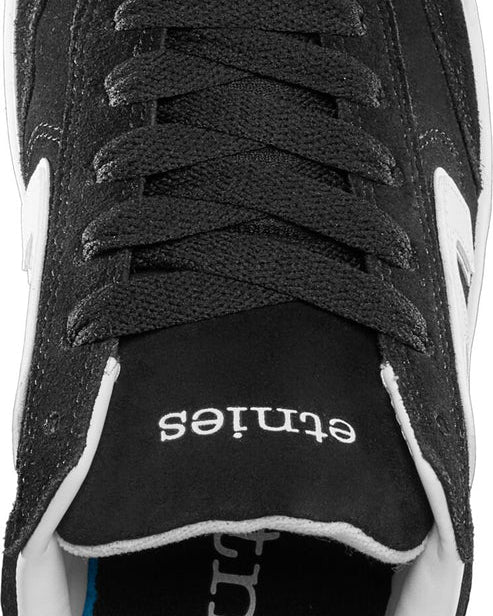 Top view highlighting tongue branding and lace detail.