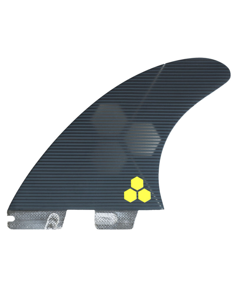 Side view of FCS II surfboard fin with striped carbon texture and yellow hex logo