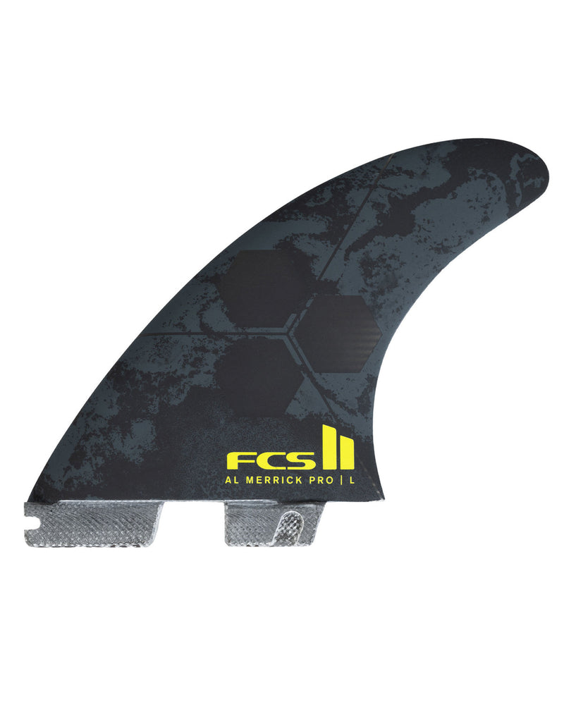 FCS II Al Merrick Pro surfboard fin with black and grey pattern and yellow FCS branding