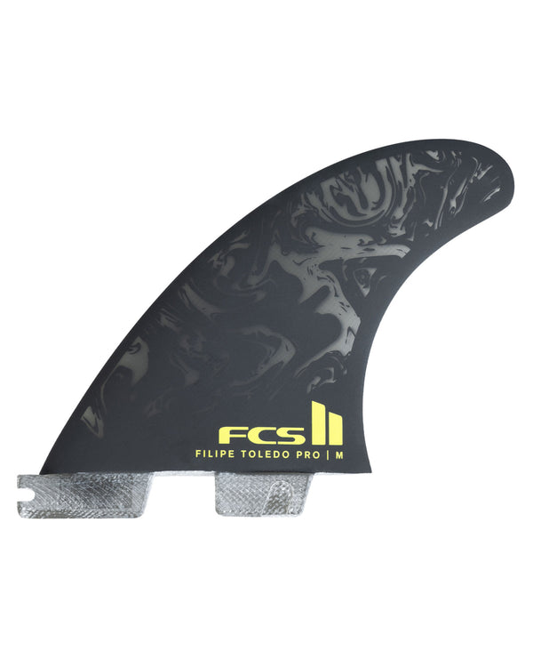 FCS II Filipe Toledo Pro surfboard fin in black with yellow logo and medium size marking