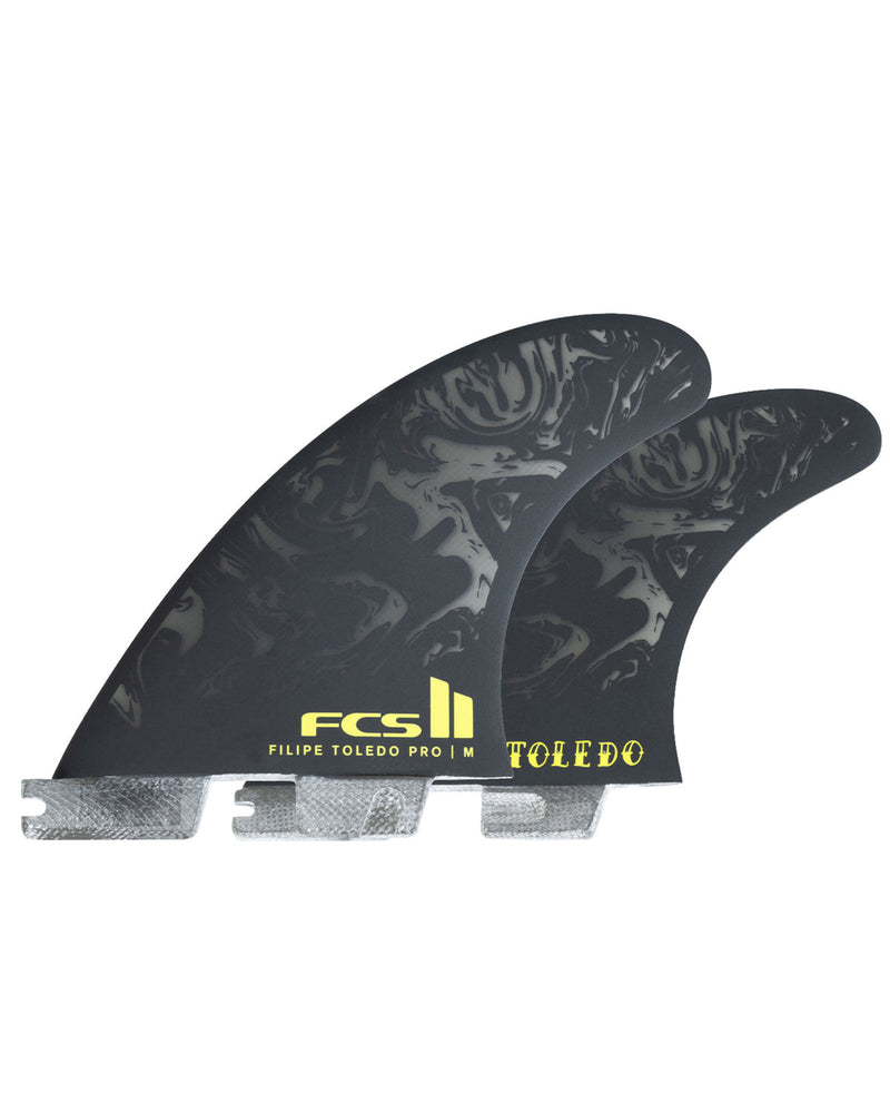 FCS II Filipe Toledo Pro thruster fin set in black with yellow branding and swirl graphic