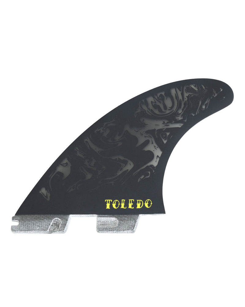 FCS II Filipe Toledo surfboard fin in black with yellow Toledo text and twin tab base