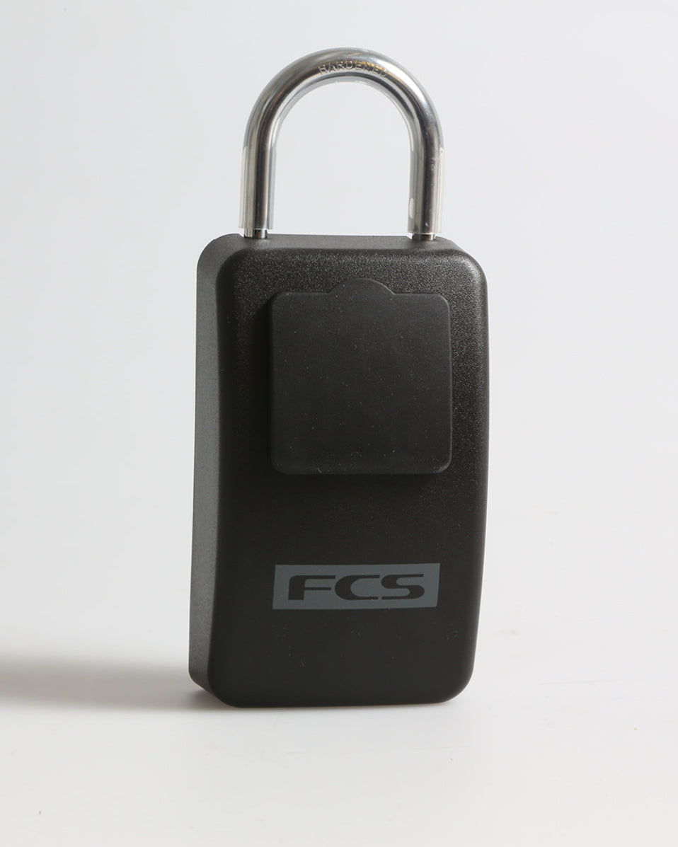 Rear view of closed FCS key lock box with cover flap and printed logo on matte black finish.