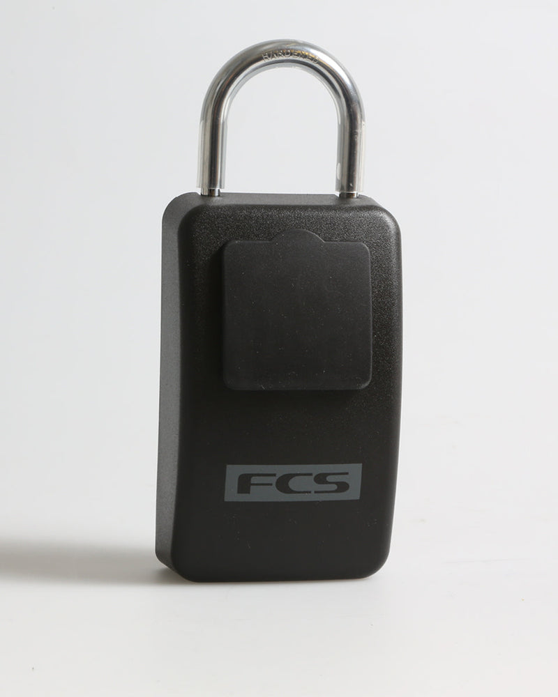 Rear view of closed FCS key lock box with cover flap and printed logo on matte black finish.