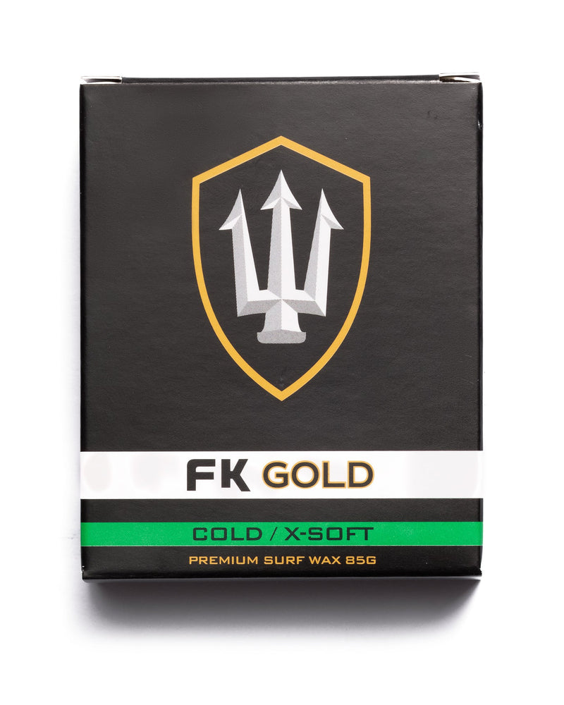 FK Gold Cold X-Soft surf wax 85g, designed for cold water with premium grip and performance in a black and green pack.

