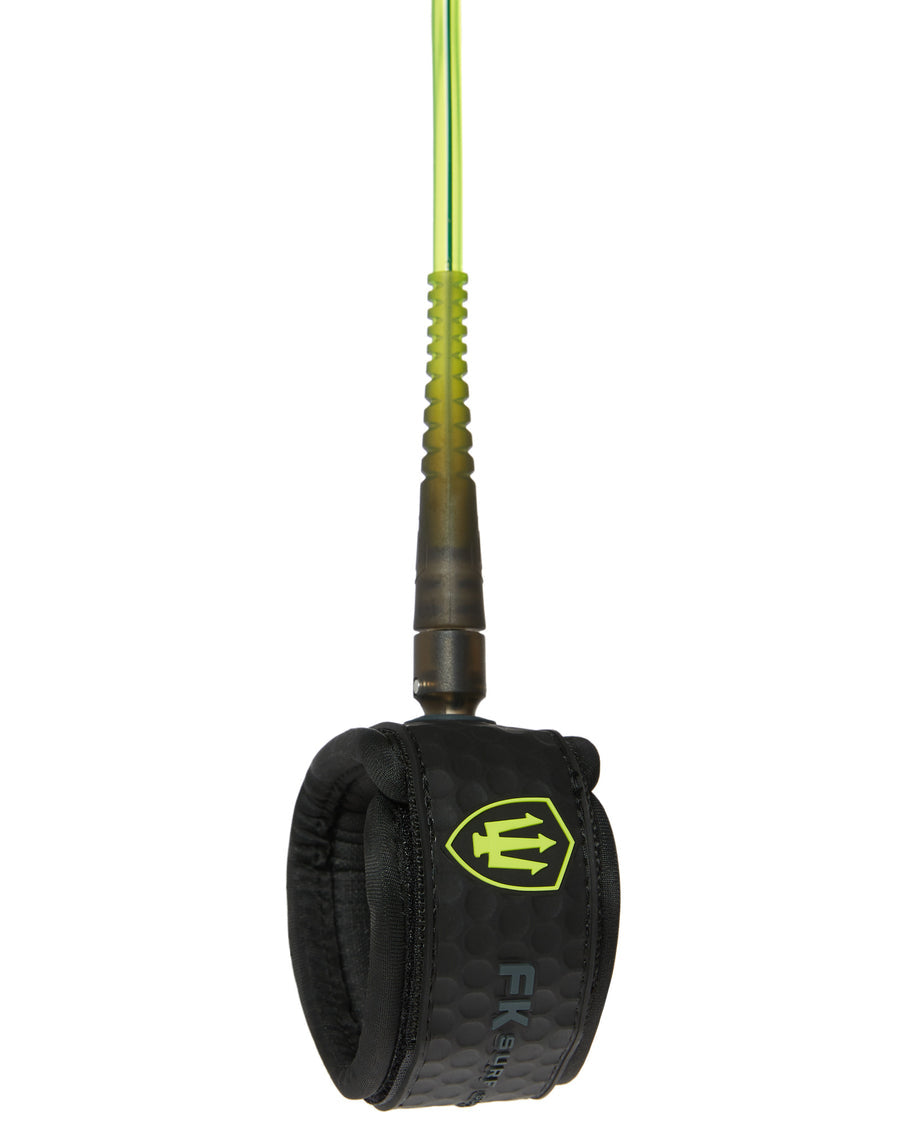 Black wrist strap with green cord on a white background