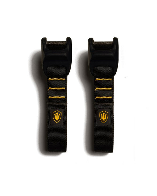 Black tie-down straps with black buckles and yellow stitching, featuring a yellow trident logo on each strap.
