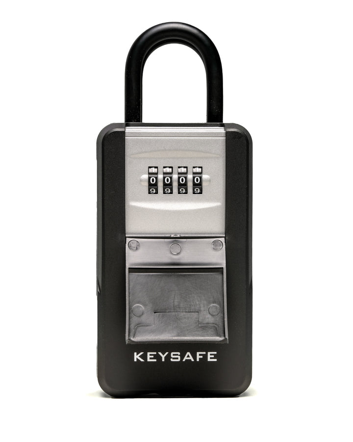 KeySafe lock box with four-digit combination dial and flip-down key access panel.