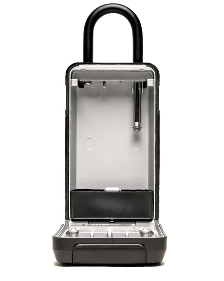 Open KeySafe lock box showing spacious internal compartment for secure key storage.