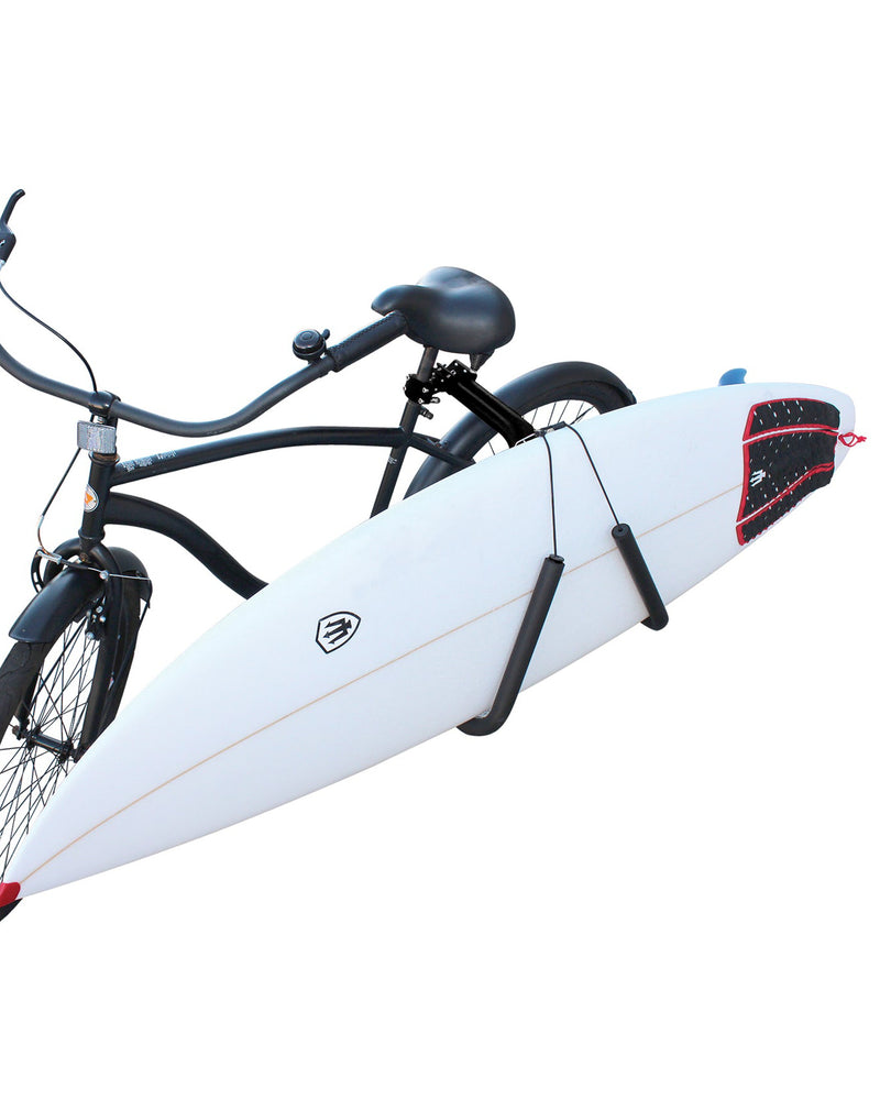 FK Surf bike rack mounted to cruiser bike carrying a shortboard on padded arms.