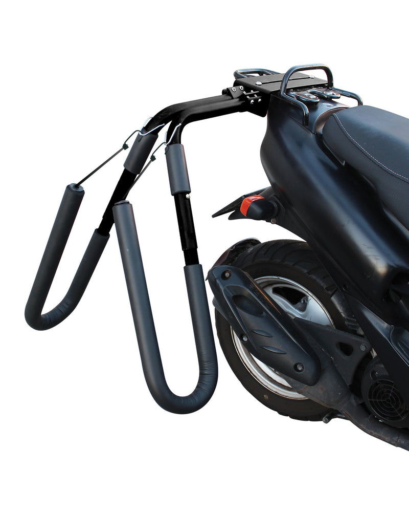 Scooter-mounted surfboard rack securely attached and ready to carry a board.