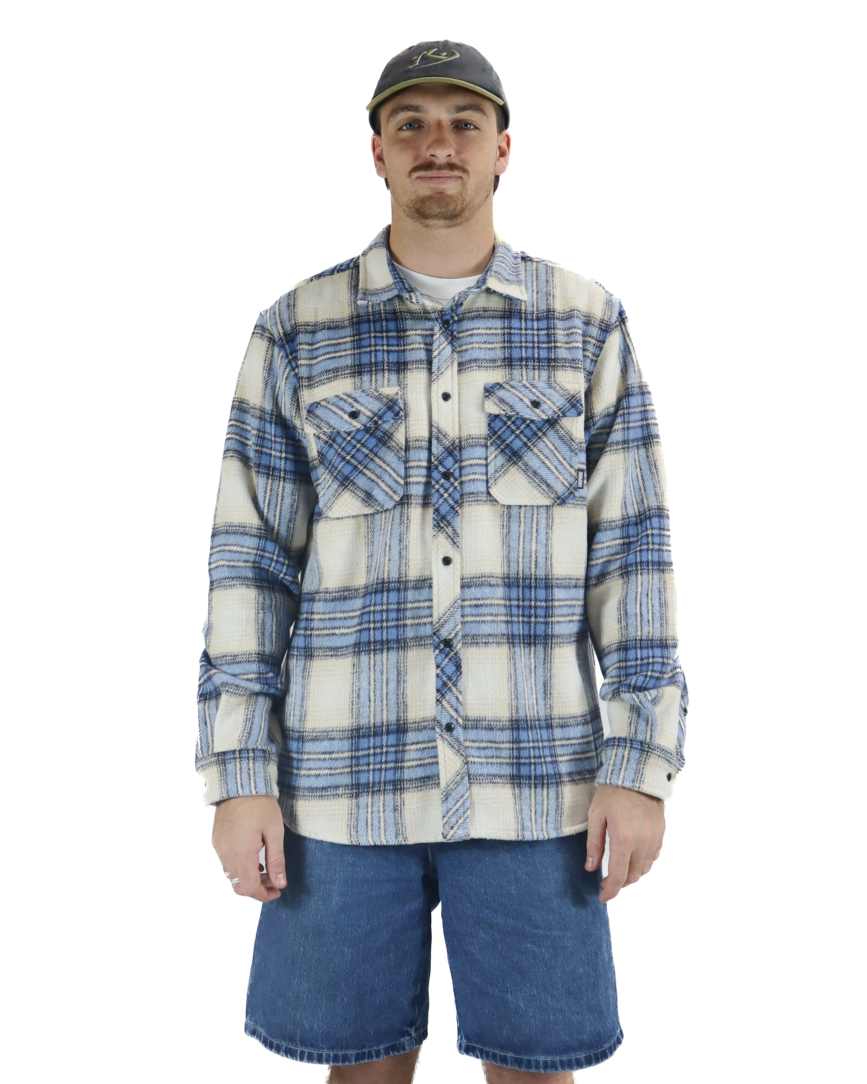 Cream and blue check flannel shirt with chest pockets and button-up front