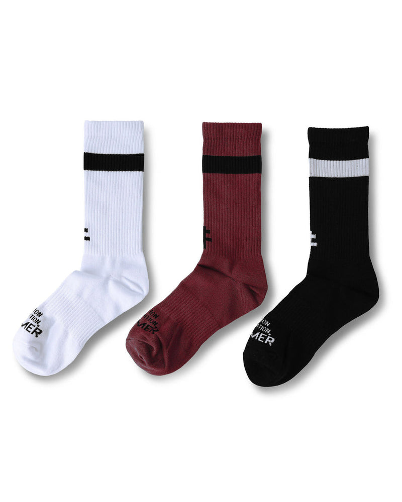 White, maroon and black crew socks with stripe and Former branding on sole and cuff.