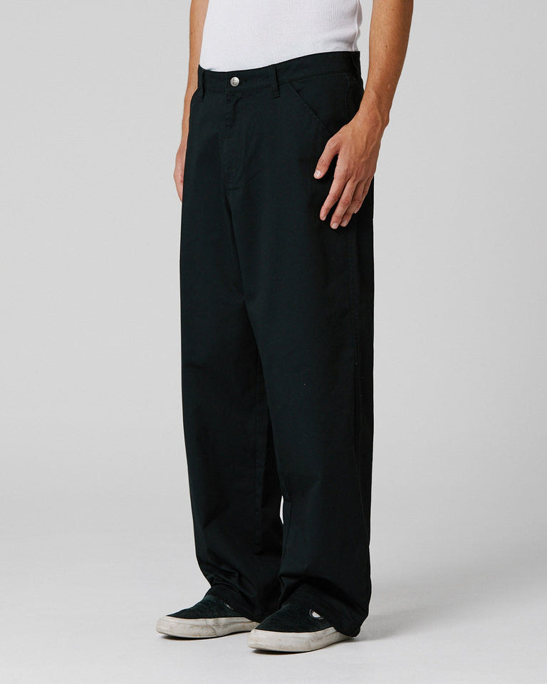 Angled view of black wide-leg pants with casual straight cut