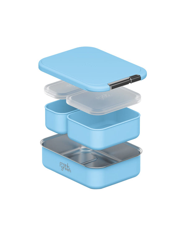 Sky blue Frank Green lunchbox set, showing multiple compartments, transparent lids, and a stainless steel interior