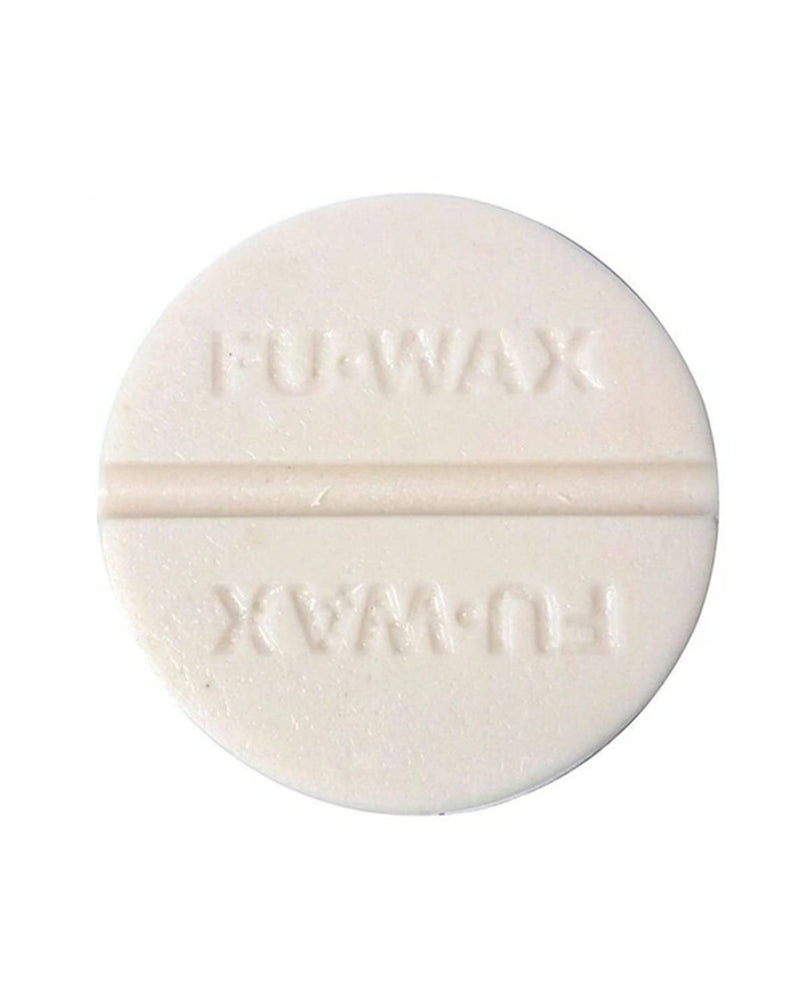 Round FU Wax bar with embossed logo and centre groove, designed for strong grip in warm water conditions.