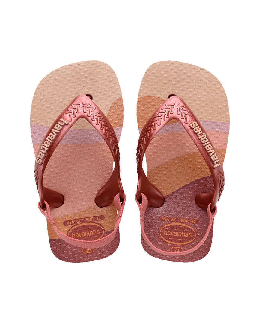 Pink and beige Havaianas flip-flops with textured straps and Brazil flag logo on the footbed
