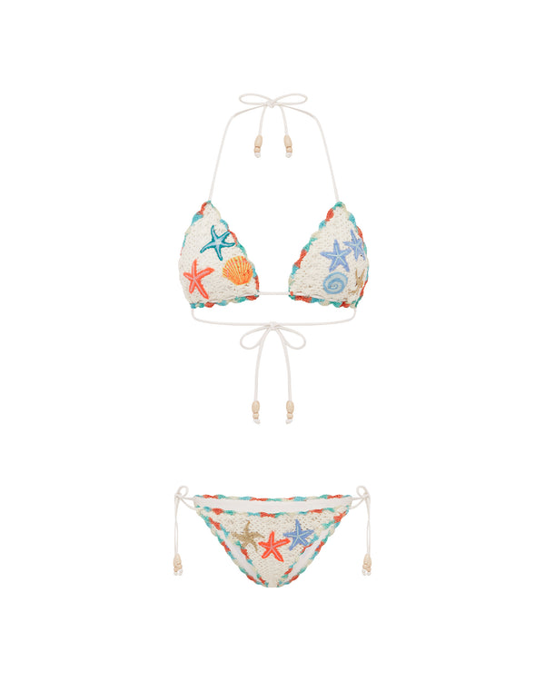 White crochet bikini set with colorful embroidered starfish and seashell details, featuring adjustable tie straps.