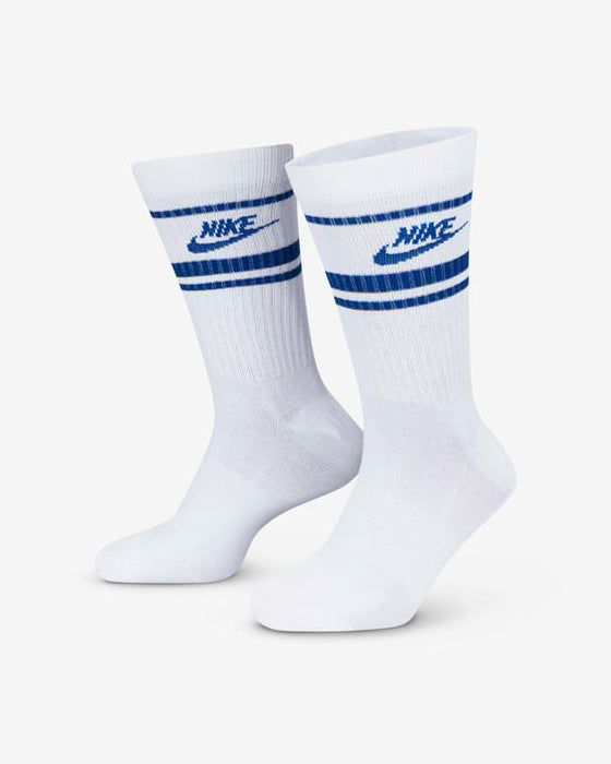 Pair of white Nike crew socks featuring blue stripes and Nike logo, offering a classic sporty look and comfortable fit.