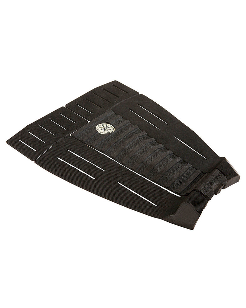 Side angle of black grip pad showing contoured arch and elevated kicktail