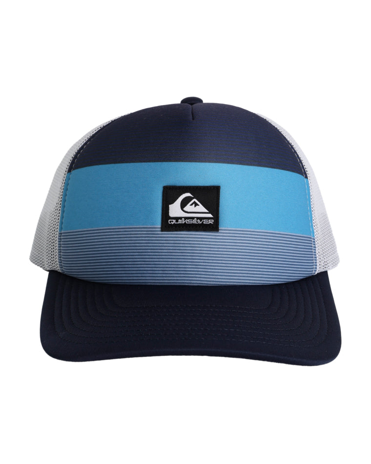 Front view of a trucker cap with navy blue and light blue panel design, Quiksilver logo patch, and curved brim.