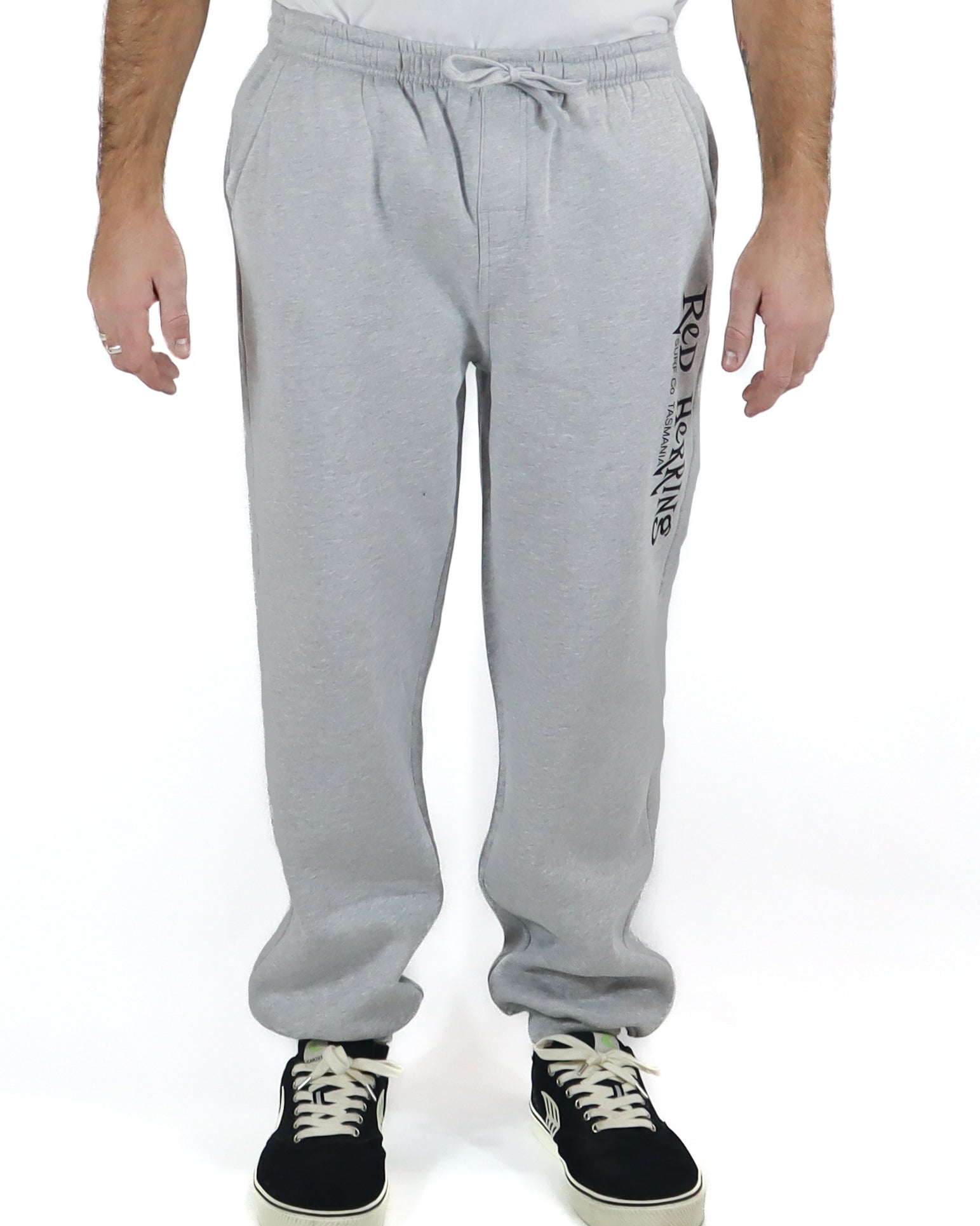 Light grey Red Herring track pants with black logo on the left leg.