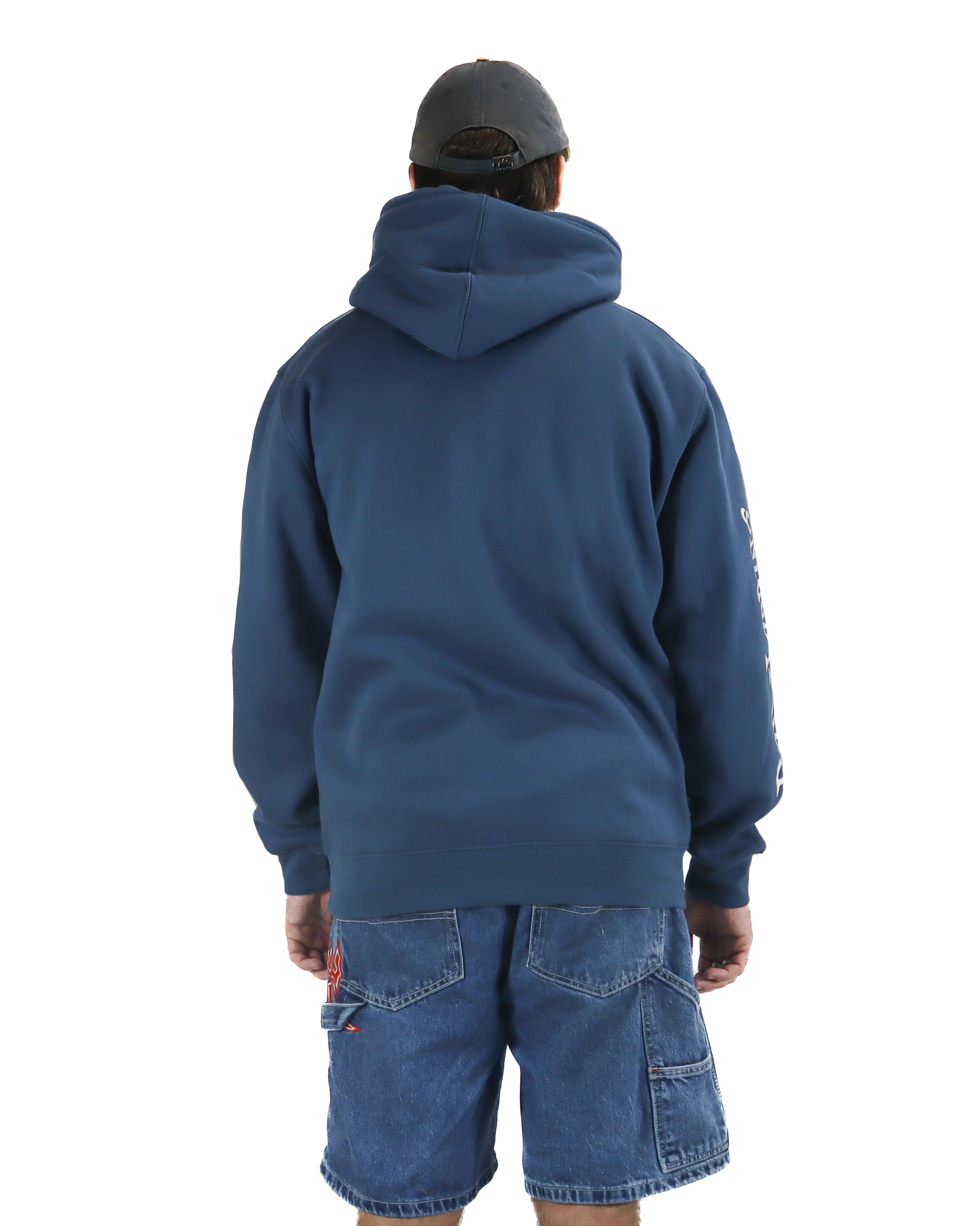Back view of a blue hoodie with relaxed fit, worn with a grey cap and blue cargo denim shorts.