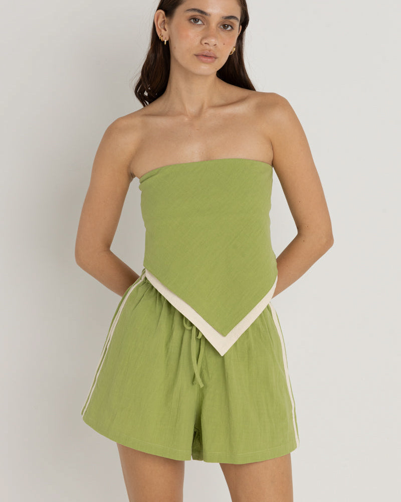 A green strapless top with a white trim, paired with matching drawstring shorts featuring side stripes.