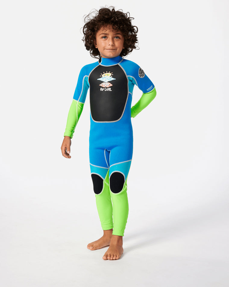 Kids' full-length Rip Curl wetsuit in blue, black and neon green with chest print.v