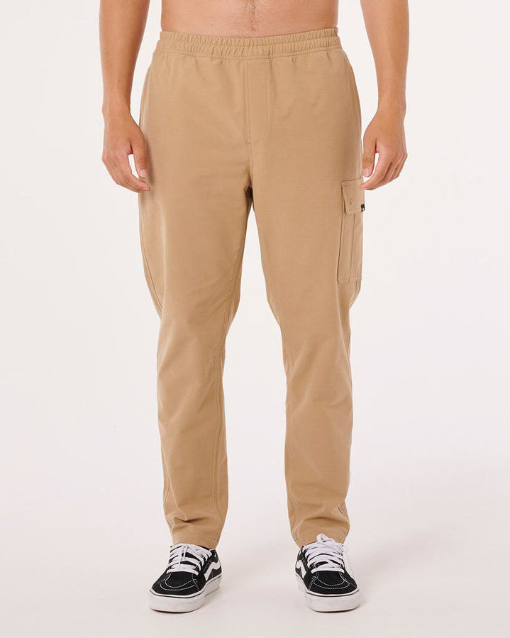 Men's tan Billabong cargo pants with elastic waistband and relaxed fit.