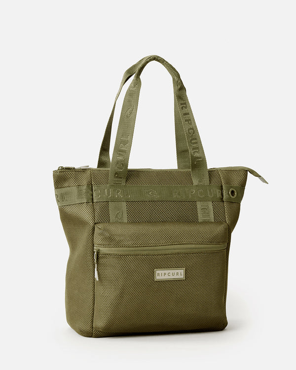 Olive green Rip Curl tote bag with mesh panels, zippered front pocket, and sturdy branded handles for versatile use.