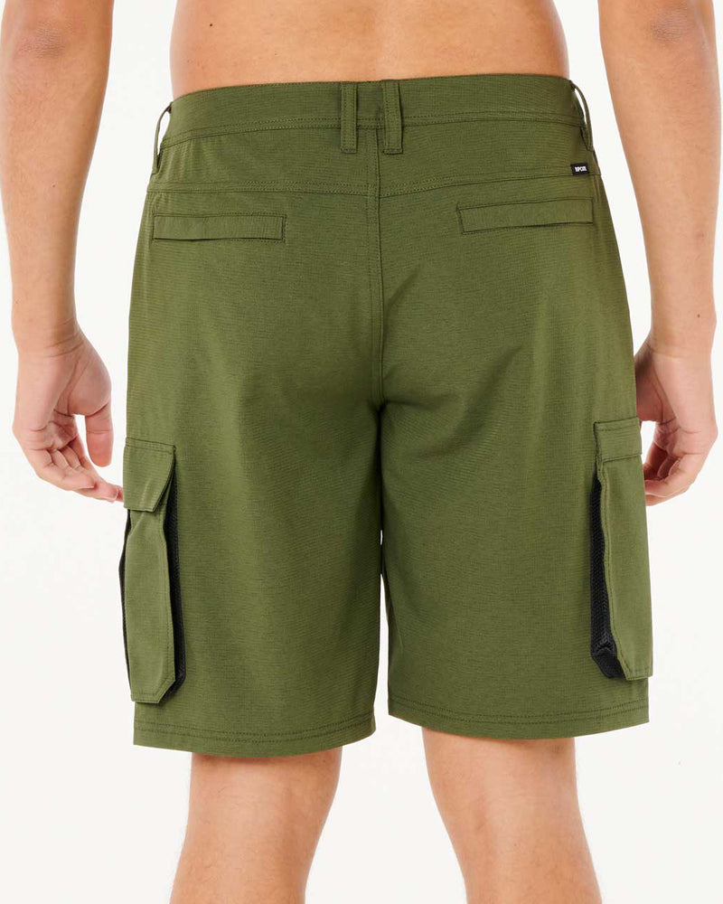Back view of olive green shorts with rear welt pockets and black mesh cargo pocket detailing.