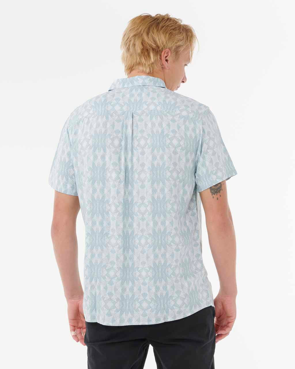 Back view of light blue patterned short sleeve shirt.