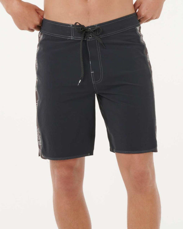 Black boardshorts with contrast stitching and drawstring waist, mid-length cut with side panel detail.