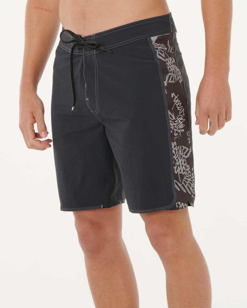 Side angle of black boardshorts with white graphic print on the side panel and adjustable drawcord.