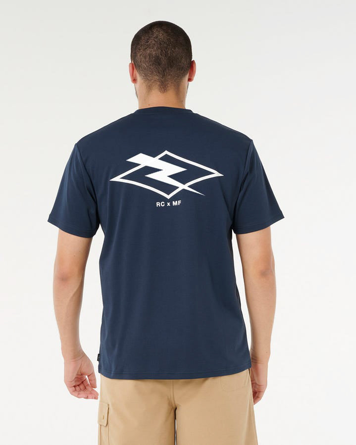 Back view of men's navy tee featuring large white RC x MF logo.v