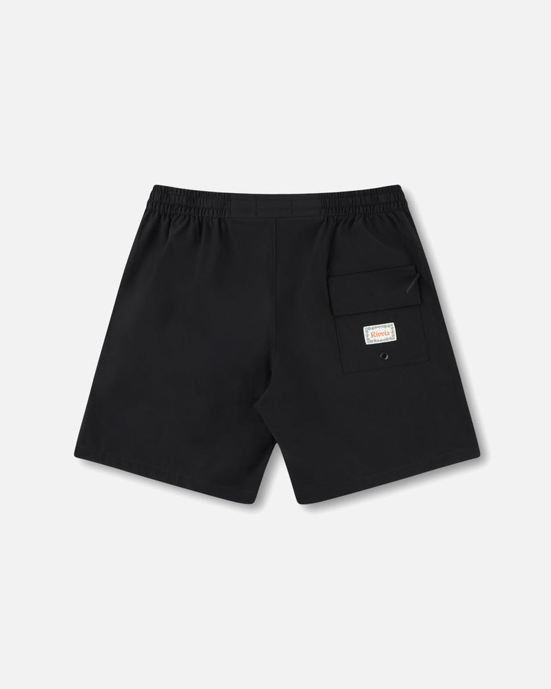 Back view of black shorts with flap pocket and Rivvia patch