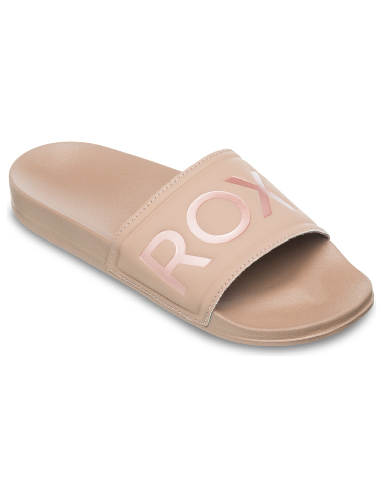 Angled view of nude Roxy slide with contoured footbed and metallic logo strap