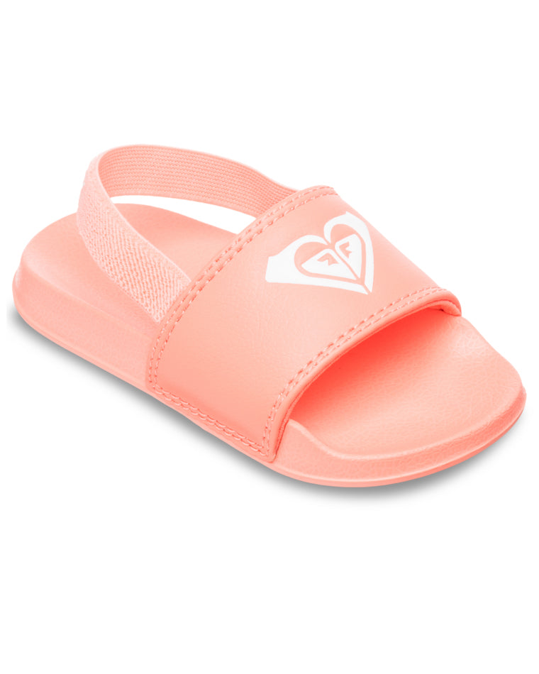 Angled view of toddler coral Roxy sandals with open toe and white heart logo.