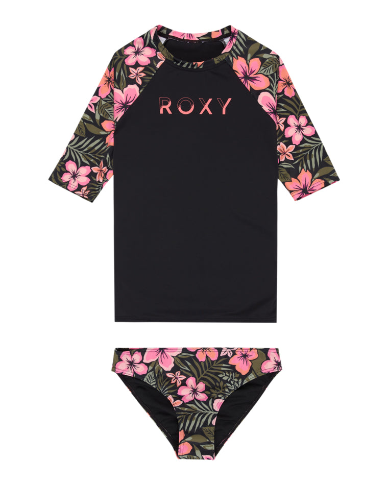 Girls’ black floral rash vest and bikini bottoms with pink Roxy branding.