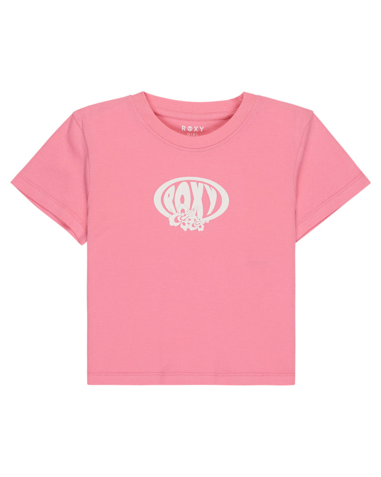 Flat lay of pink Roxy girls’ tee with white retro logo and floral print.