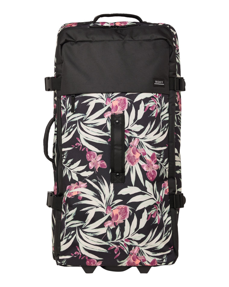 Roxy floral wheeled travel bag with tropical print, black top panel and front compression straps