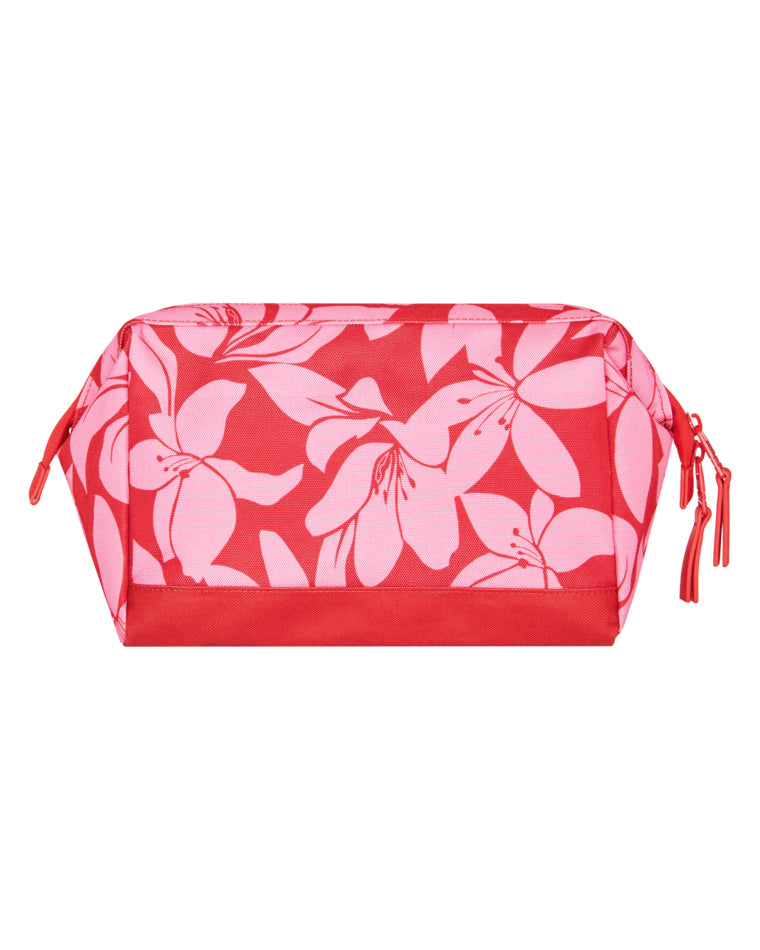 Back view of red Roxy pouch featuring bold pink floral pattern.