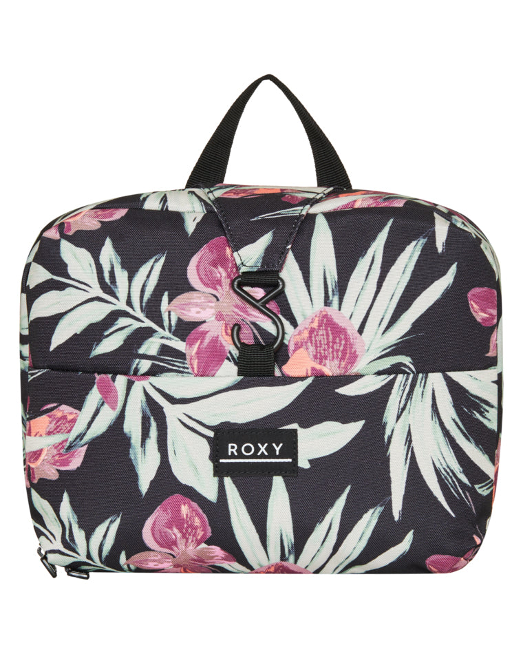 Roxy floral travel pouch with pink and green tropical print and black clip on front