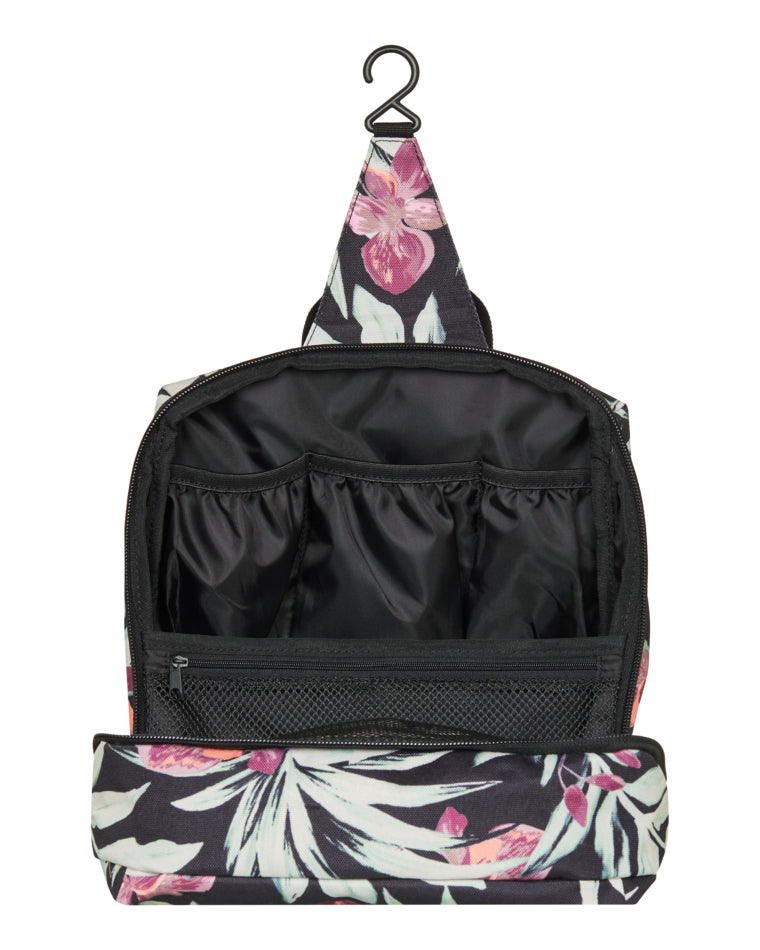 Open Roxy travel pouch showing black internal compartments and hook for hanging