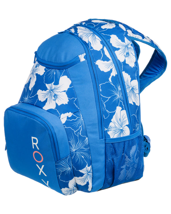 Side view of a blue Roxy backpack featuring a white floral print, zippered compartments, mesh side pocket, and padded straps.